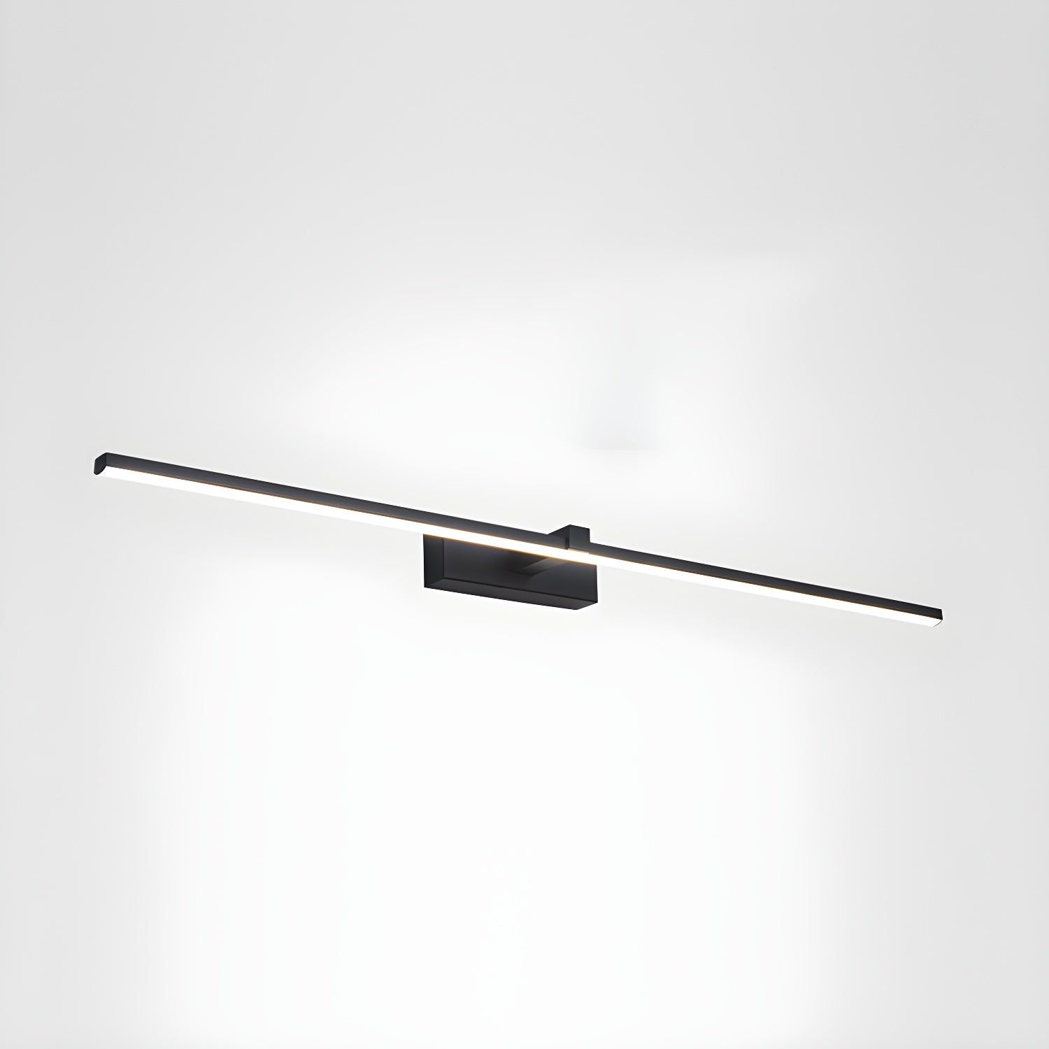 Linear LED wall light glowing in a minimal setting