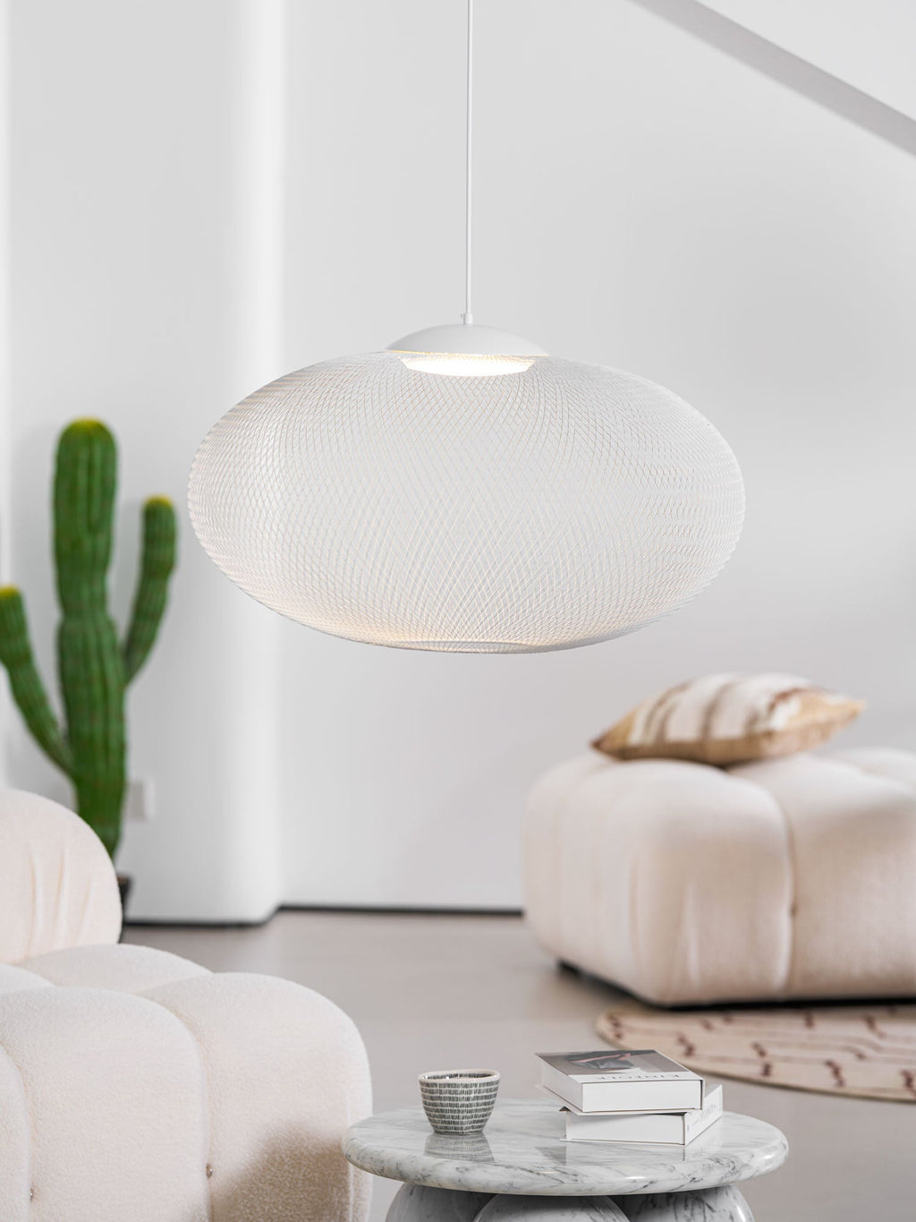 Latticed iron pendant light with soft hued light