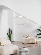 Latticed pendant light shown against a dark backdrop