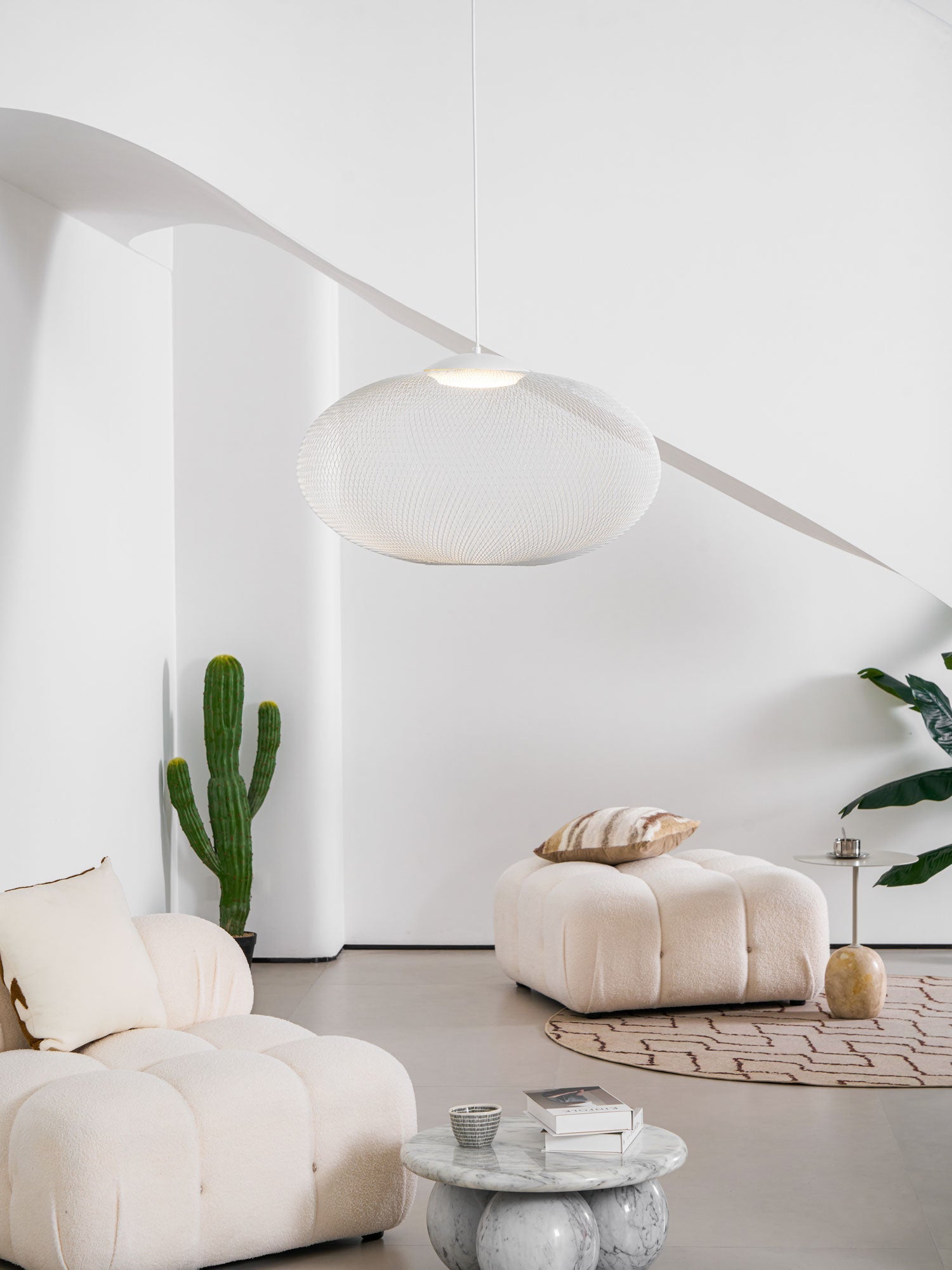 Latticed pendant light shown against a dark backdrop