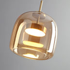 Smoked glass pendant light close-up showing warm glow