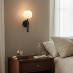 Mian wall lamp black arm and carved alabaster flowers detail