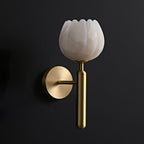 Mian wall lamp brass arm detail with botanical stone shade