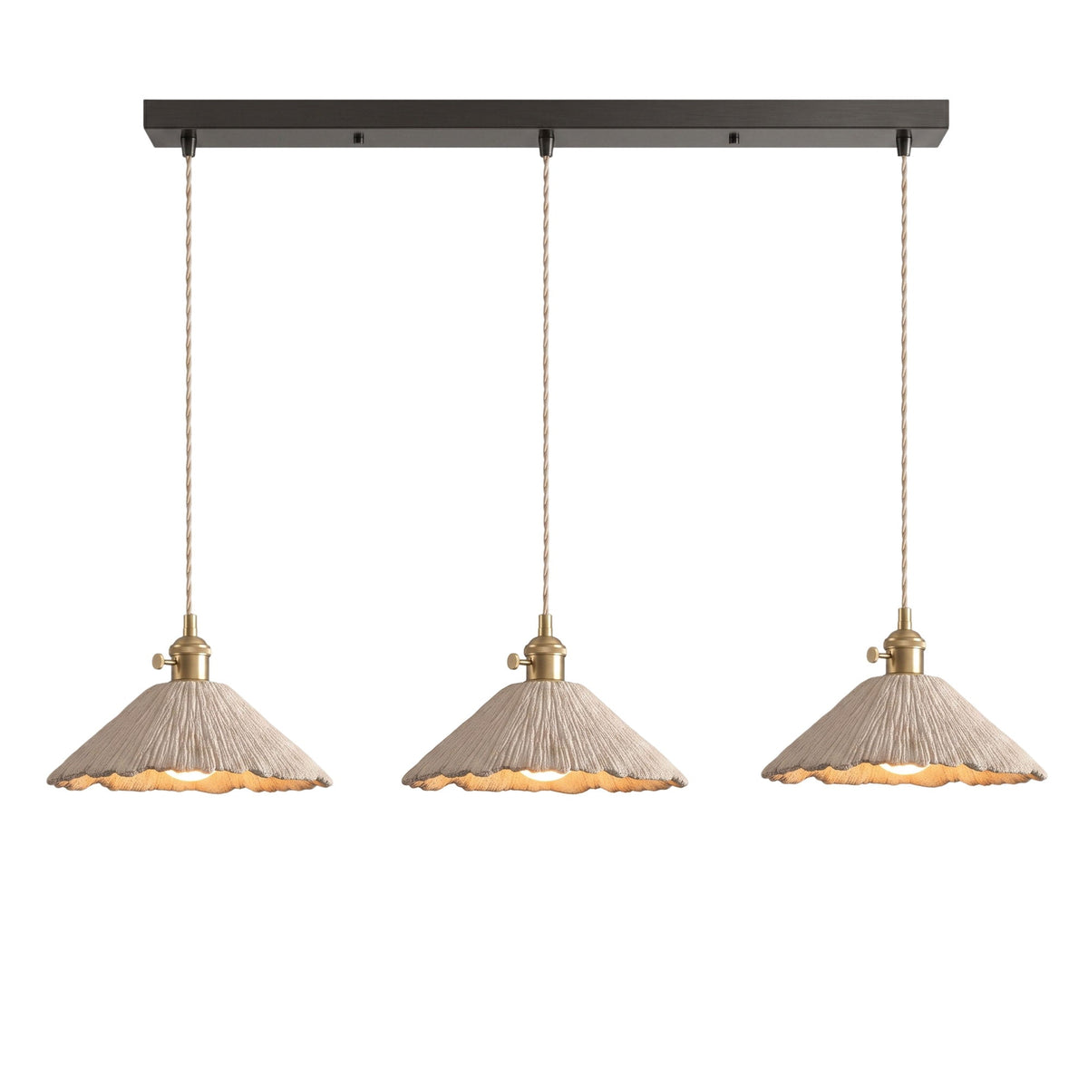 Three wide scalloped cone microcement pendants hung in a row from a dark linear ceiling canopy on braided cords