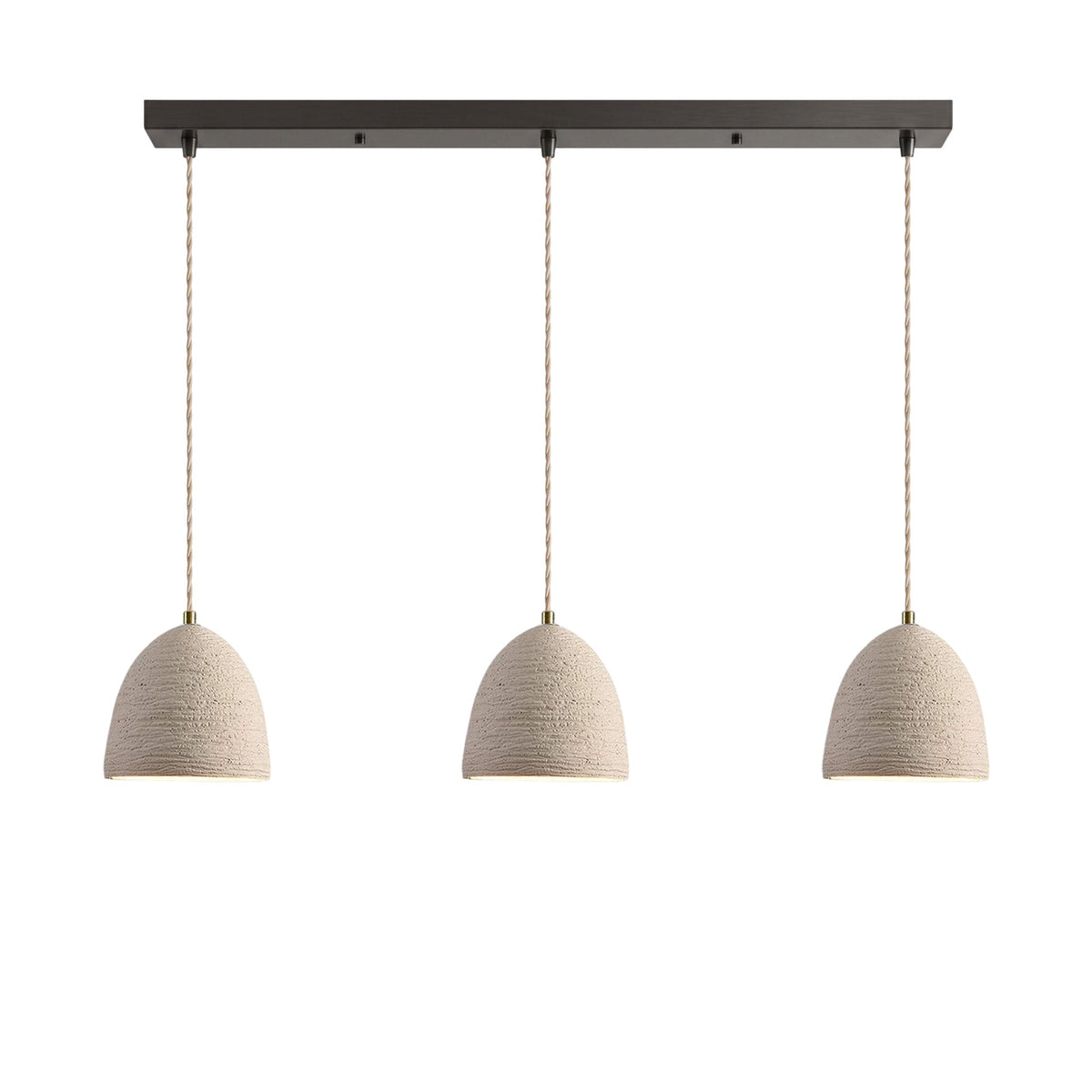 Three small bell dome microcement pendants hung in a row from a dark linear ceiling canopy on braided cords