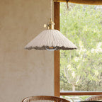 Microcement pendant light shown in a wabi sabi interior