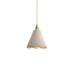 Microcement pendant light with raw cement shade and gold fitting