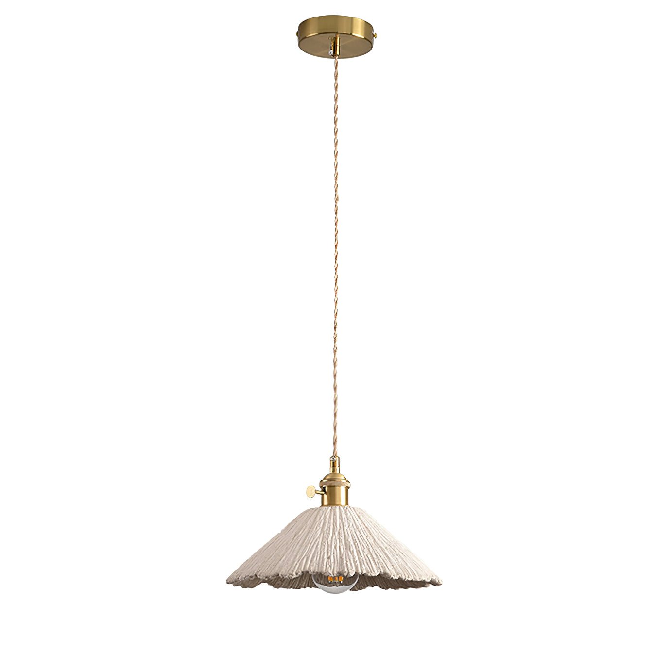 Microcement pendant light suspended over a dining area