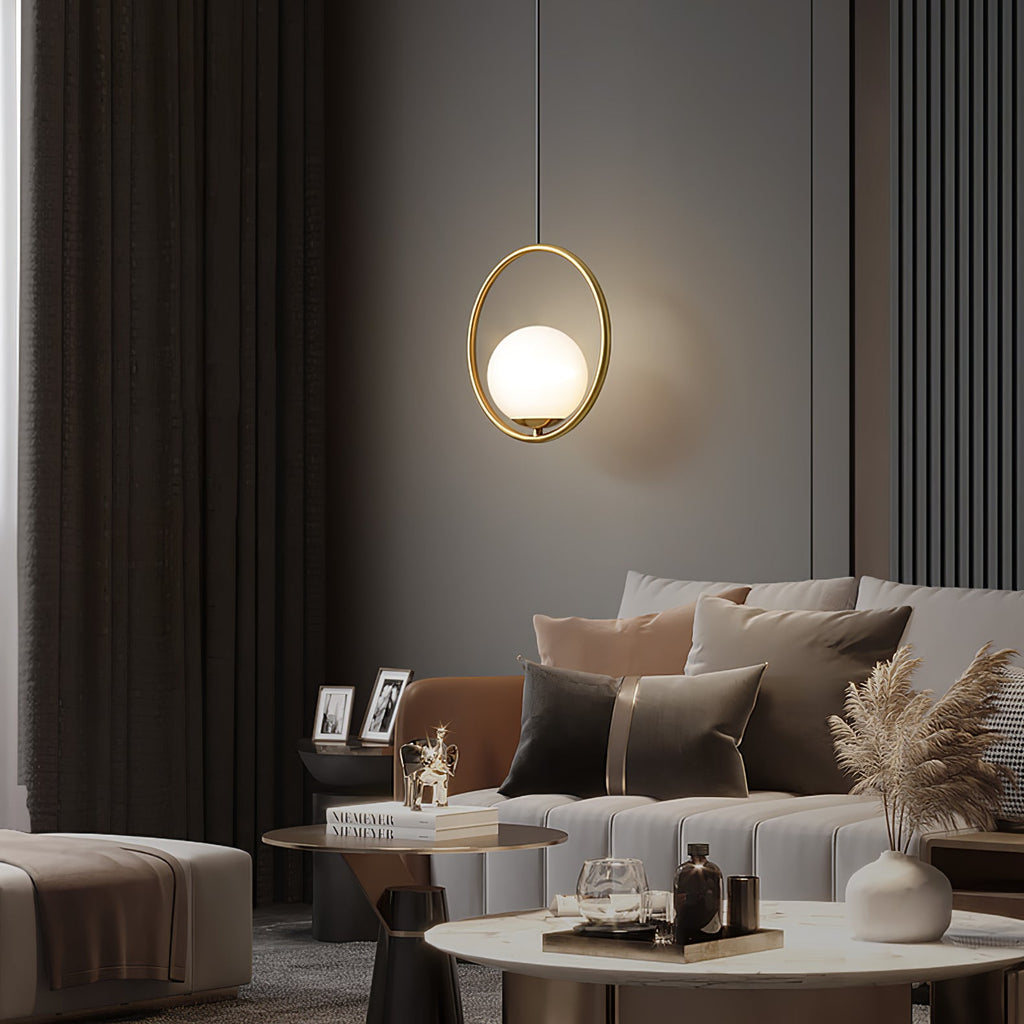 Brass and white glass pendant light detail of the arm