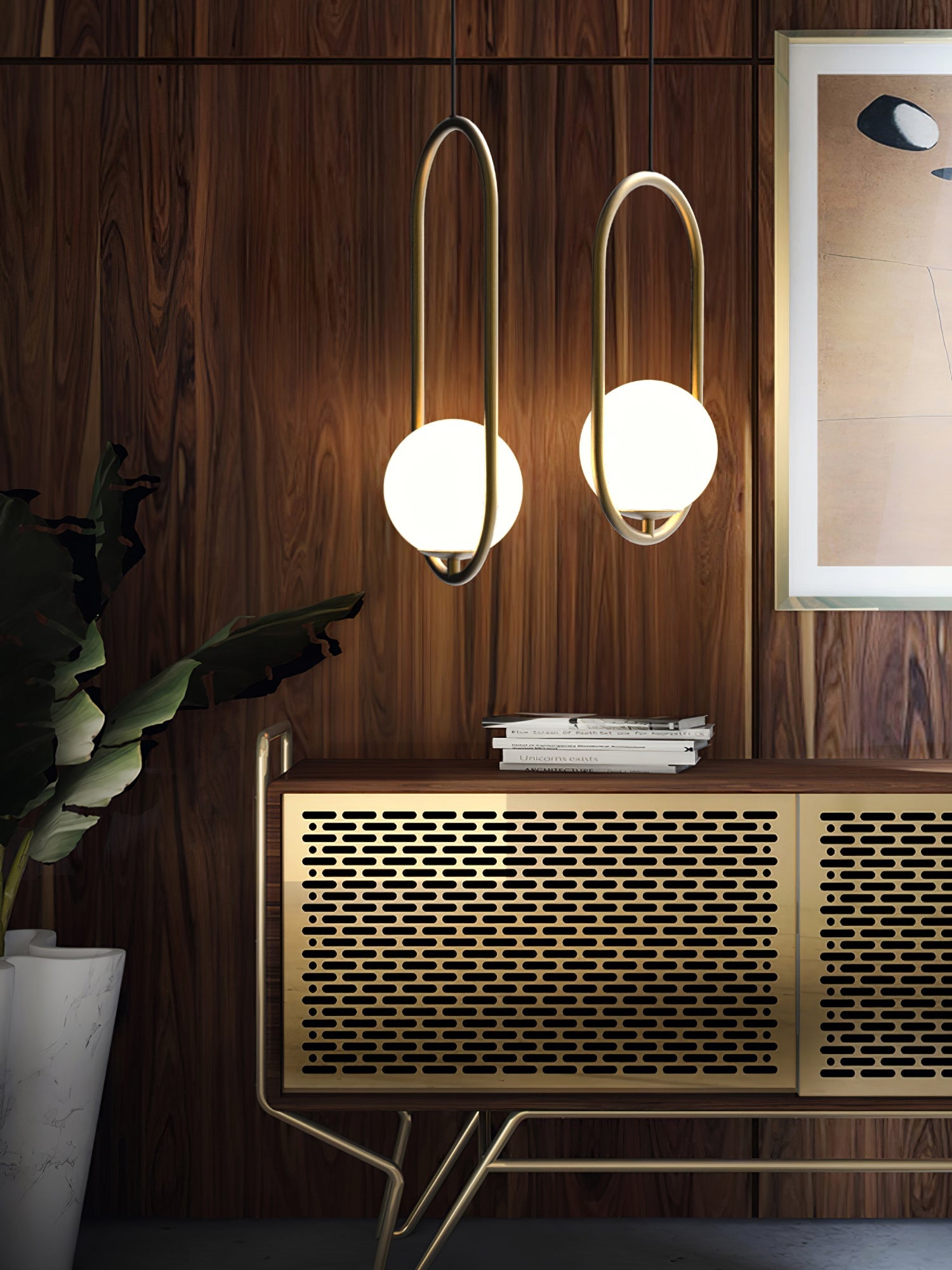 Glass ball pendant light shown lit in a dining space