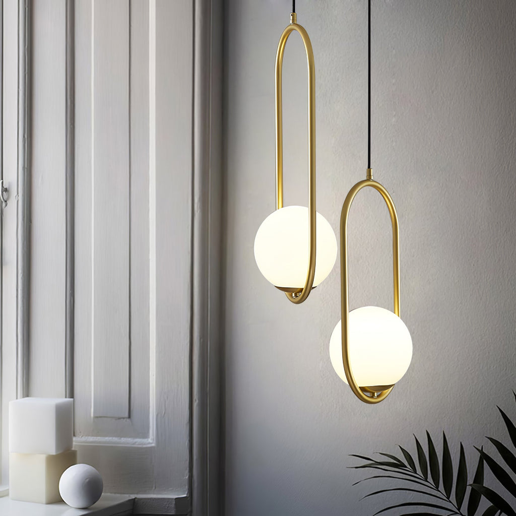 Glass ball pendant light hanging in a minimal space