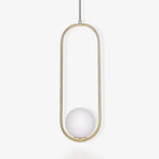 Glass globe pendant light suspended from a slim cord