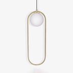 White glass globe pendant light against a plain wall