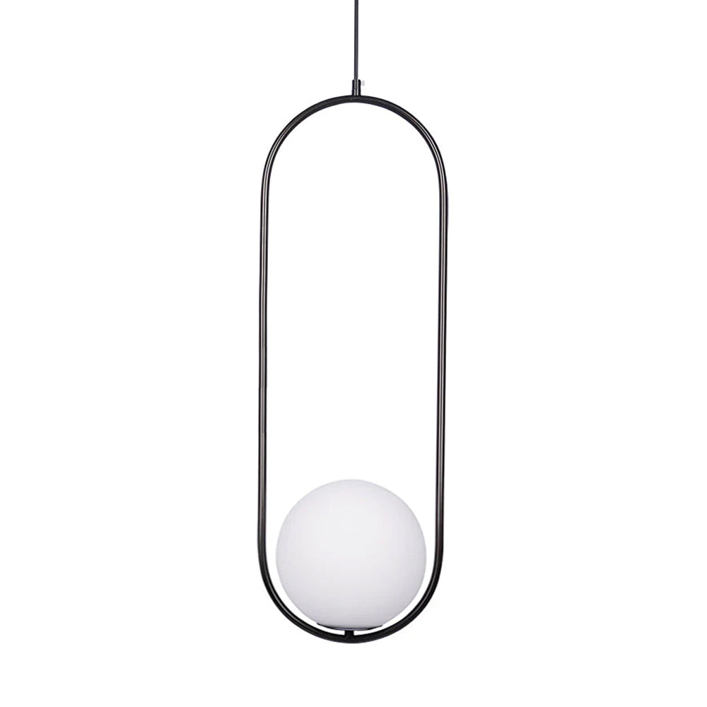 White glass ball pendant light shown lit warmly