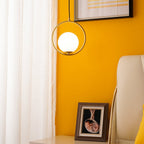 Capsule white glass pendant light glowing softly