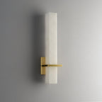 Unlit front view on grey, the brass arm and rectangular backplate standing off the alabaster