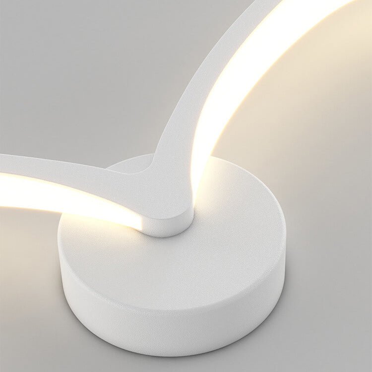 Applique murale en forme d’aile, fer et acrylique, lumière LED chaude