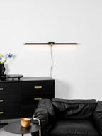Slim wall lamp with warm light in a modern bathroom