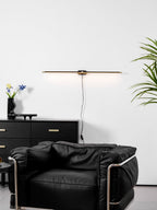 Linear LED wall lamp casting an even glow on a mirror