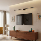 Slim cordless wall lamp lighting a hallway with warm glow