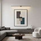 Linear wall lamp detail showing the clean white diffuser glow