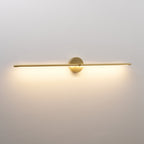 Slim wall lamp bar shown glowing in a styled interior