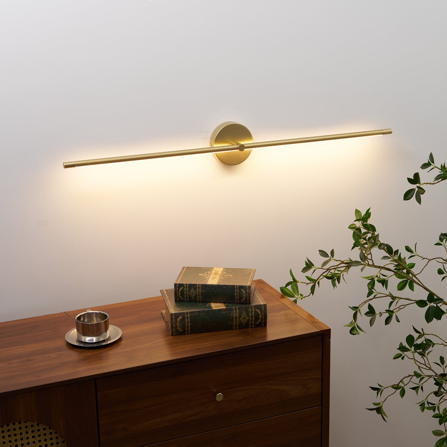 Slim wall lamp bar above a bathroom vanity mirror