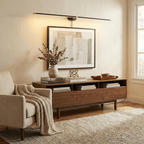 Slim LED wall lamp casting a soft even wash