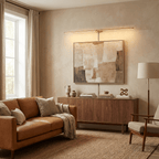 Slim LED bar lamp casting warm light on a wall