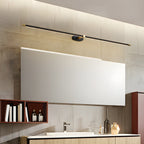Slim linear wall lamp glowing warm in a minimalist interior