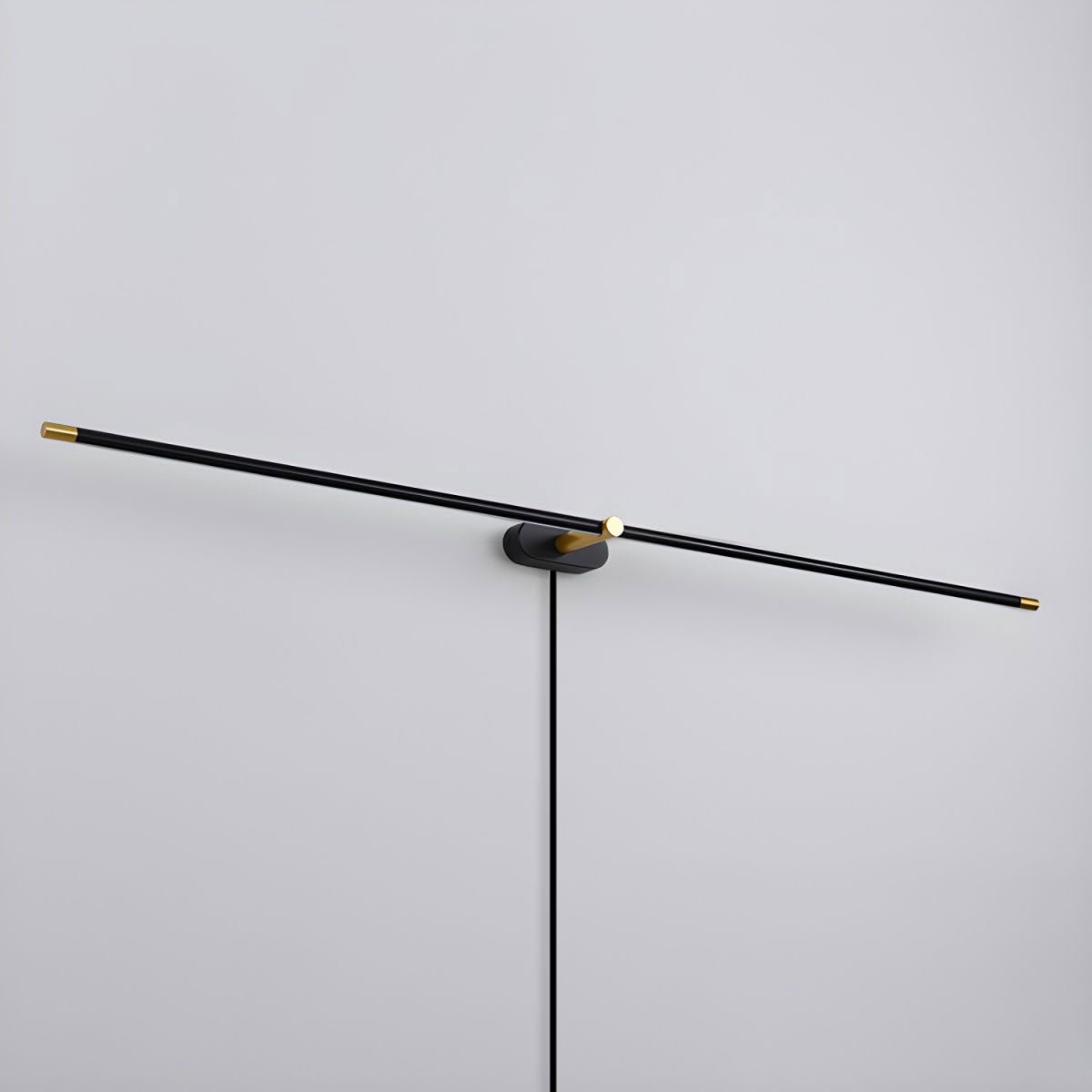 Slim LED bar lamp casting warm even light on a wall