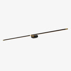 Slim rechargeable wall lamp with warm light beside a mirror