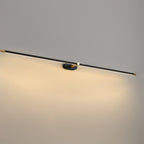 Slim linear cordless wall lamp glowing warm above a mirror