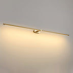 Minimalist linear wall lamp casting soft light over a vanity