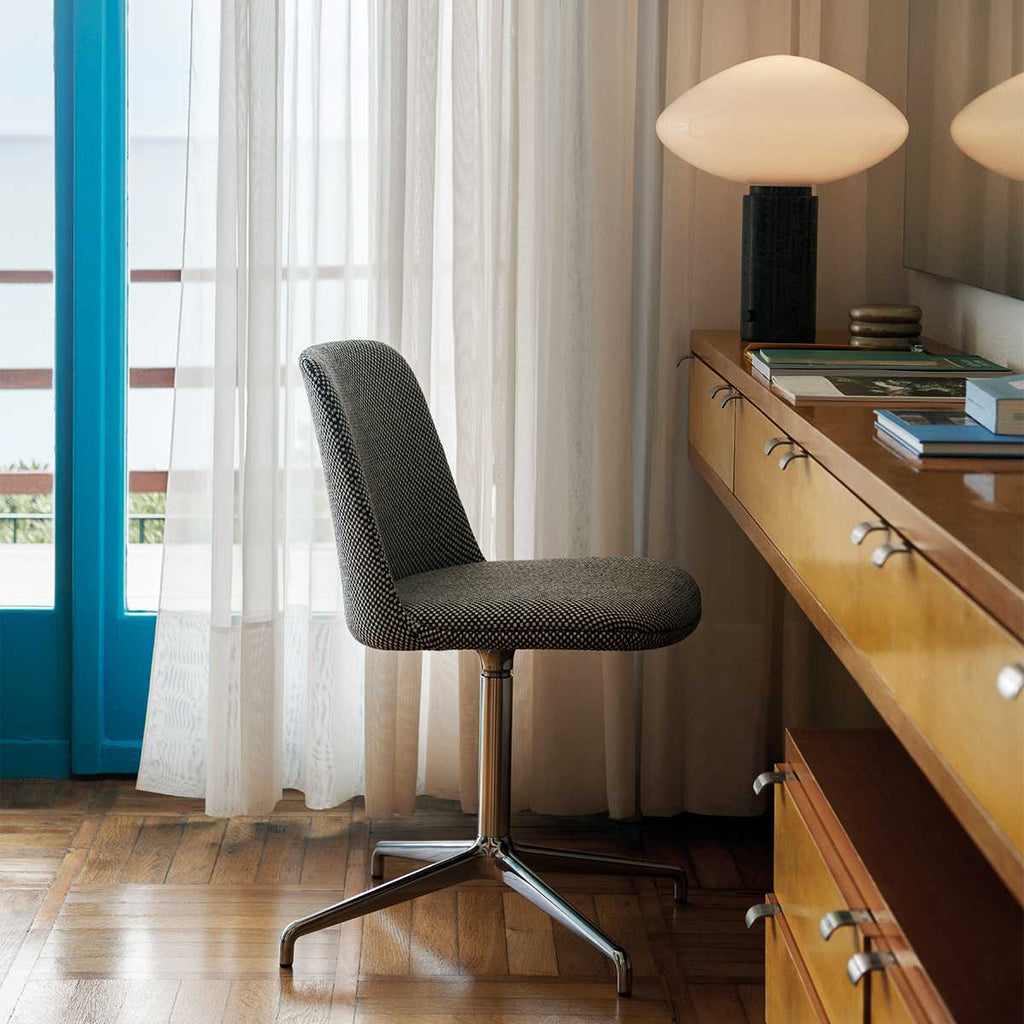 Clérachic marble table lamp lit on a sideboard, a wider view of the office chair and window beside it.