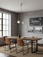 Minimalist chandelier with opaline globes glowing softly