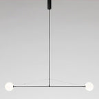 Minimalist chandelier with opaline diffusers in a styled room
