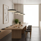Opalescent pendant light shown at an angle when lit