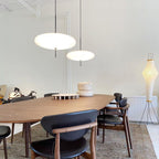 Opal disc pendant light with smooth white shade detail