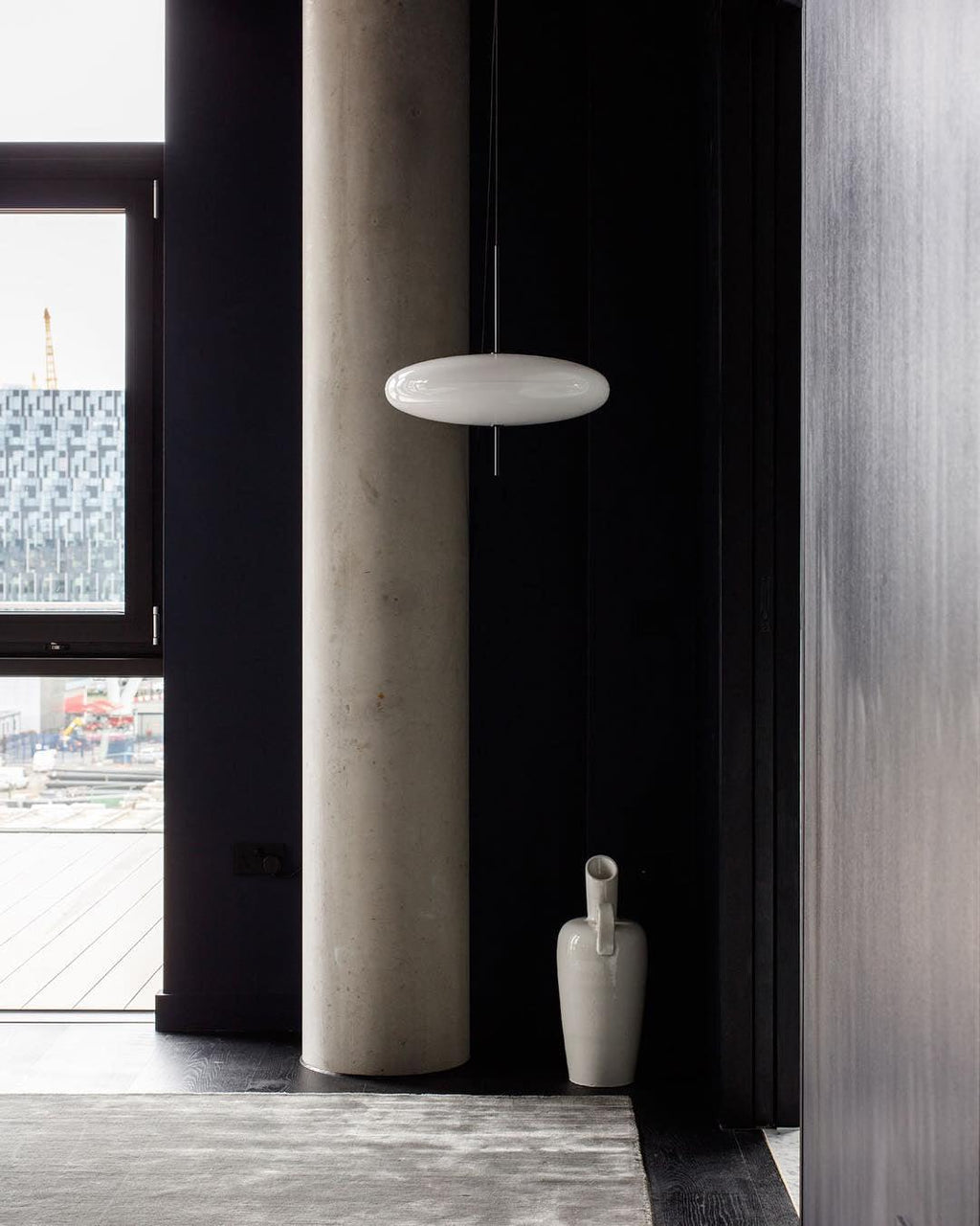 Opal disc pendant light detail with seamless joint