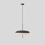 Opal disc pendant light shown lit in a dim room