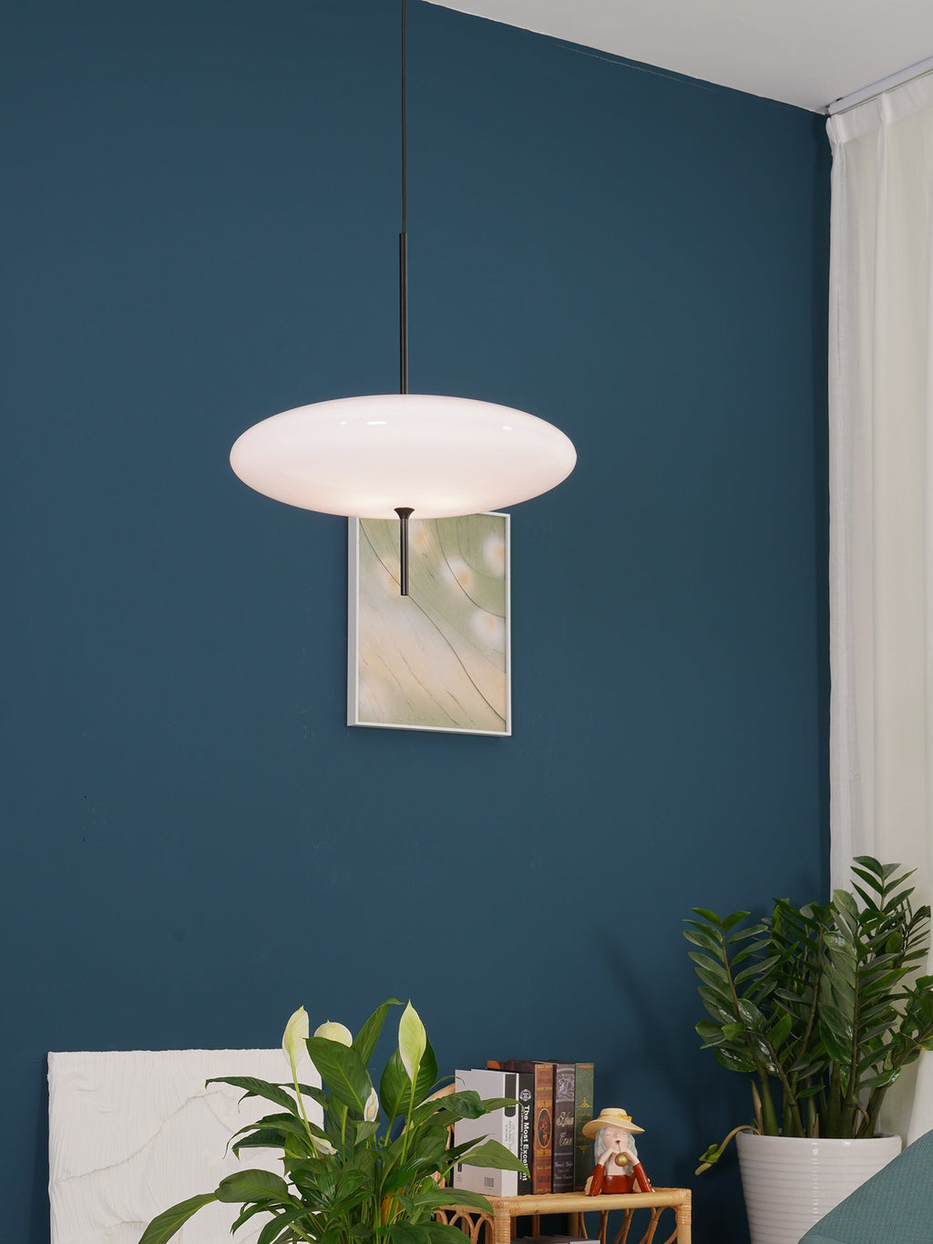 Elliptical opal disc pendant light with white shade