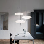 Opalescent pendant light casting an even soft glow