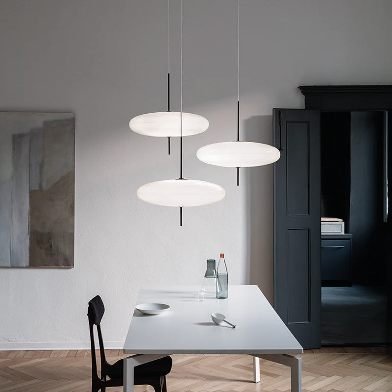 Opalescent pendant light casting an even soft glow