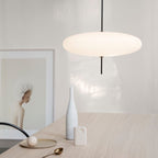 Opalescent disc pendant light viewed from below
