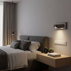 LED bedside reading light with head extended for reading in bed