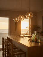 Molten pendant lamp glowing warmly over an island