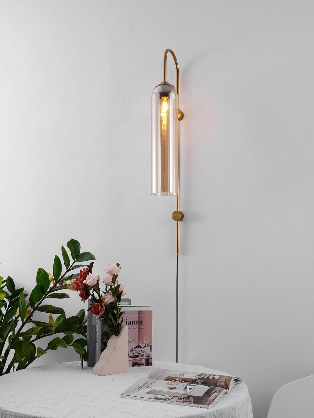 glass wall lamp styled in a hallway as a wall accent