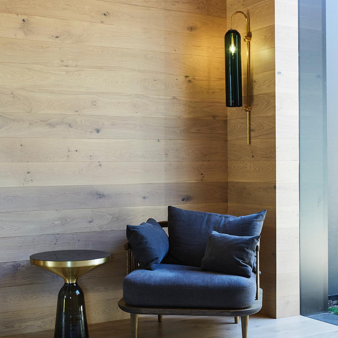 Modern glass wall lamp close-up of the cylinder shade