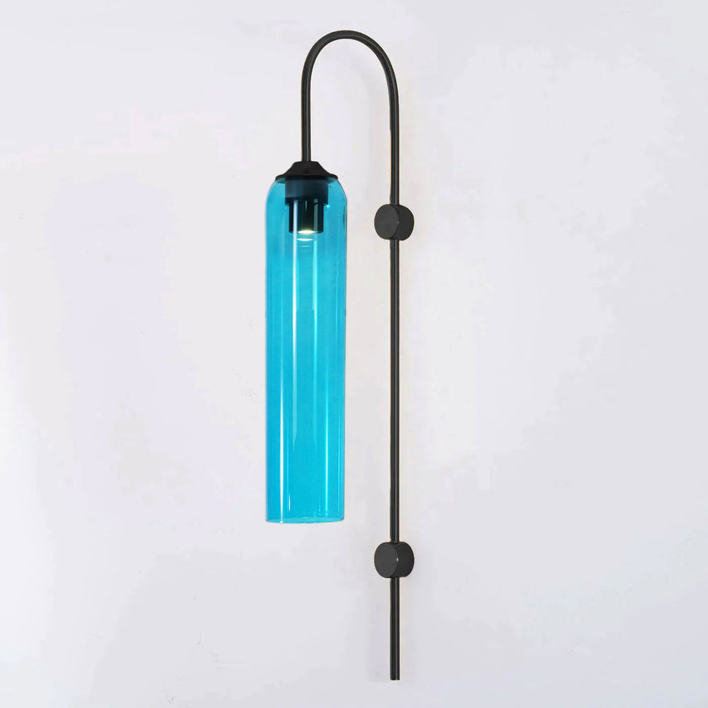 Modern glass wall lamp shown in a contemporary room